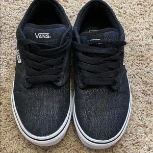 Black and metallic Vans